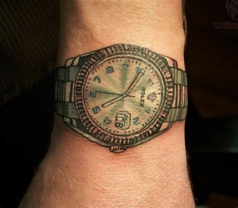 rolex tattoo on wrist